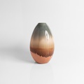 Oval ceramic vase in earthy tones