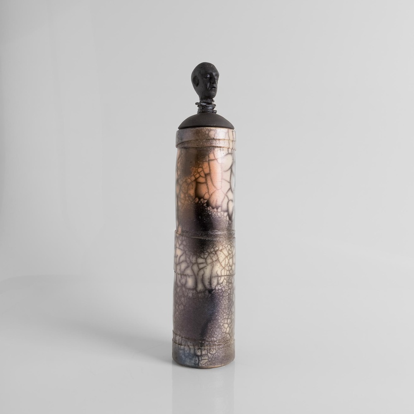 Cylindrical figure-head