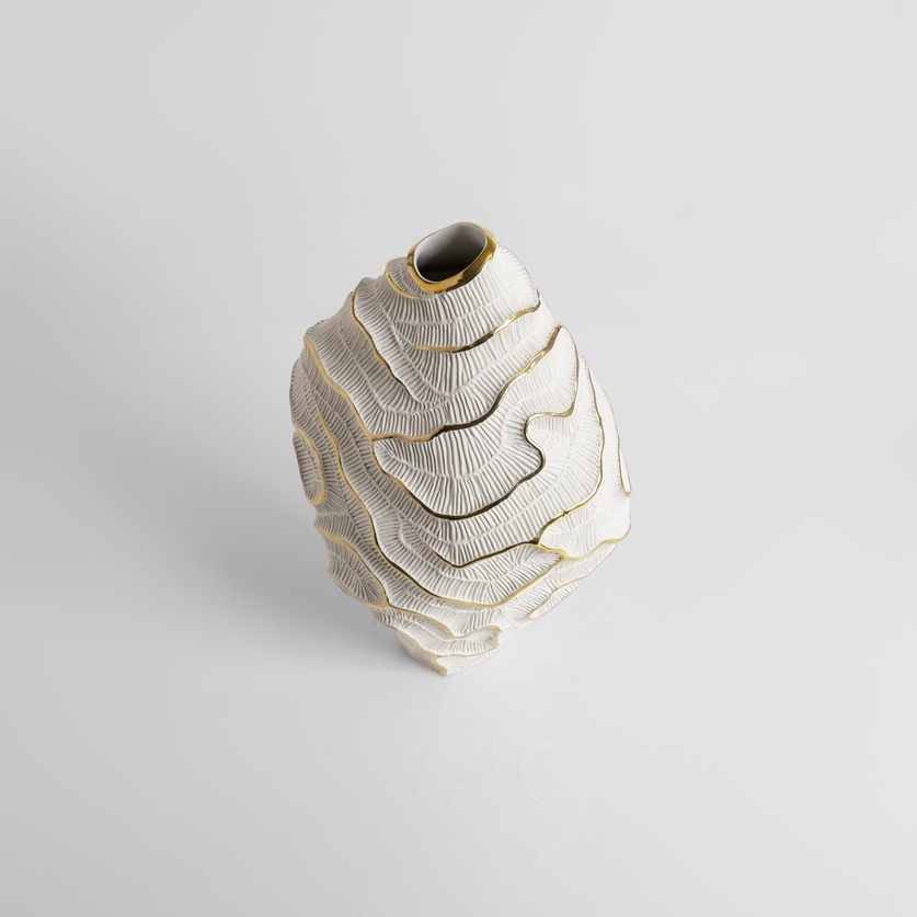Striking porcelain form with gold accents
