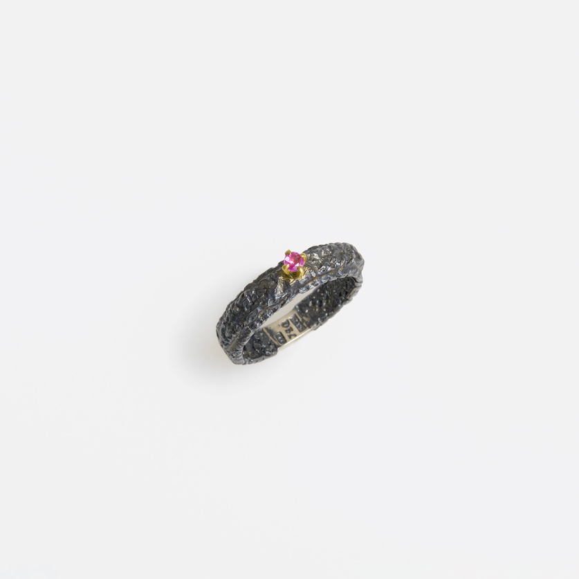 Rough surface silver ring with gold inlay and ruby