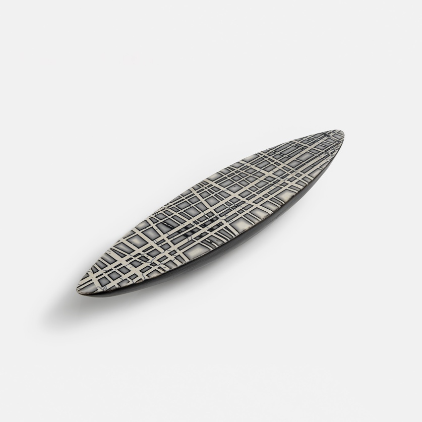 Large decorative ceramic canoe-shaped form