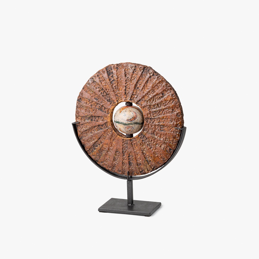 Ceramic disc with sphere