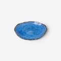 Light blue ceramic platter of irregular shape