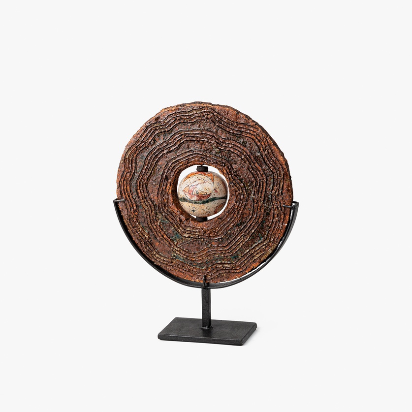 Ceramic disc with sphere