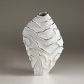 Striking porcelain form with gold accents