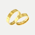 Gold wedding rings with a brilliant-cut diamond