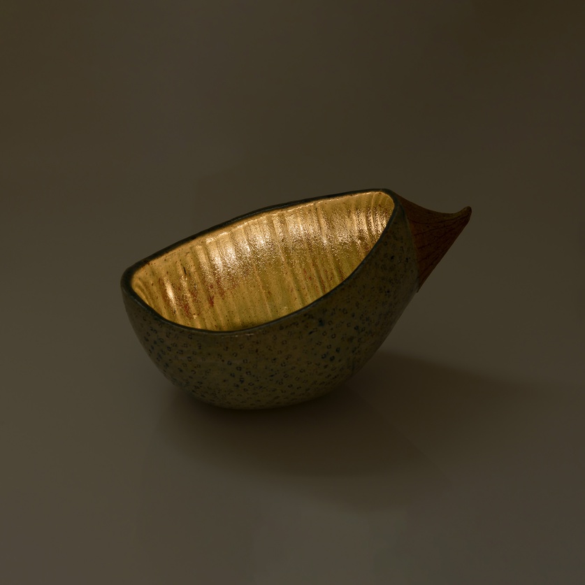 Small ceramic "canoe-shaped" bowl