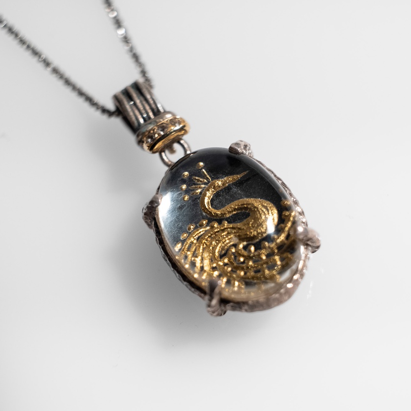 Necklace “Peacock” in silver and gold with engraved quartz and white topaz