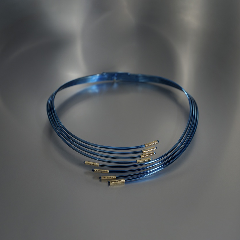 Bold titanium necklace with gold edges