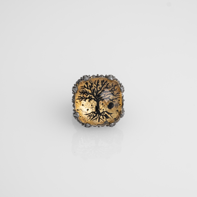 Silver ring with engraved quartz featuring a tree