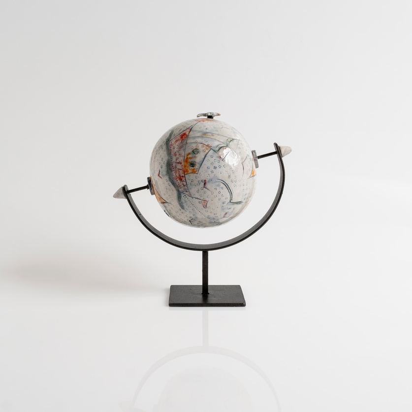 Ceramic globe with bird