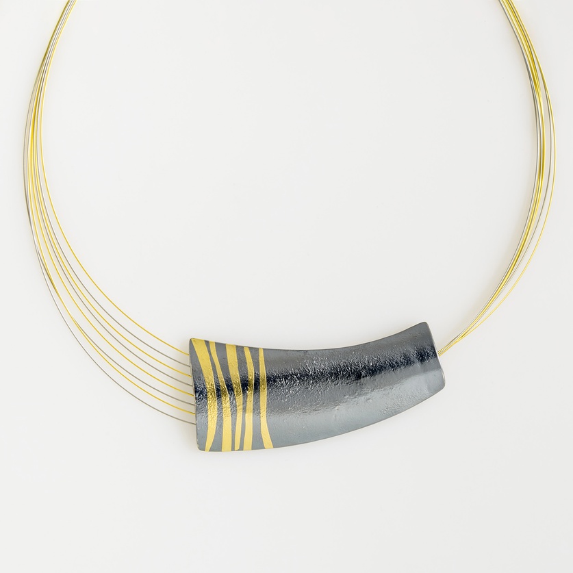 Impressive silver necklace with gold inlay