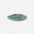 Turquoise ceramic platter of irregular shape