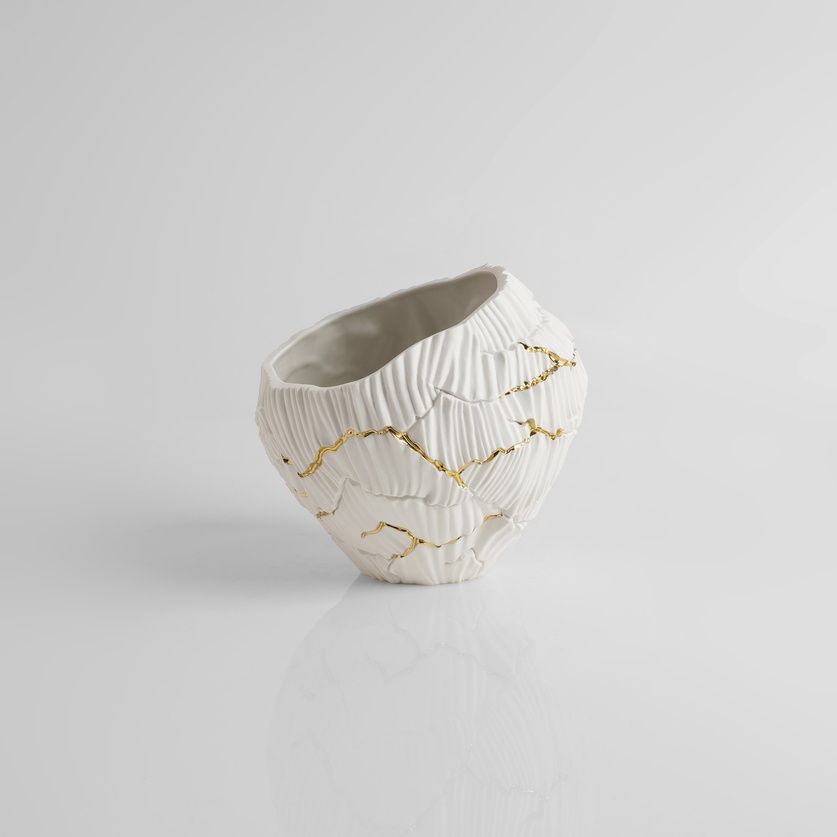 Low porcelain form with gold accents