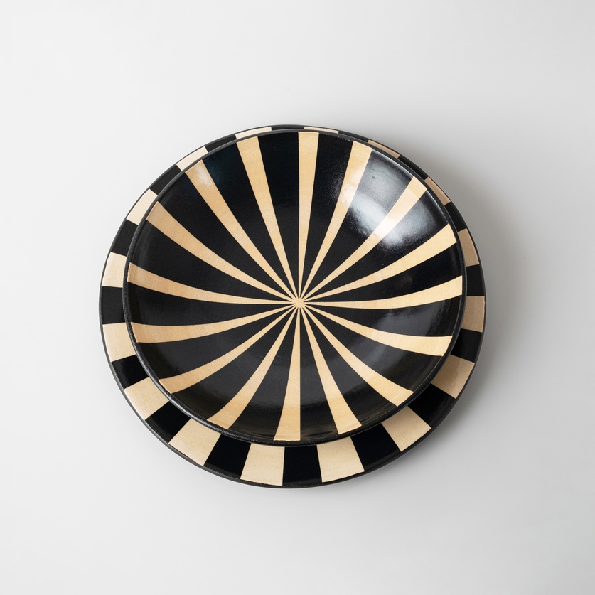 Ceramic decorative platter with black and beige stripes