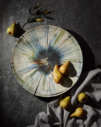 Unique round platter with blue and greenish colors