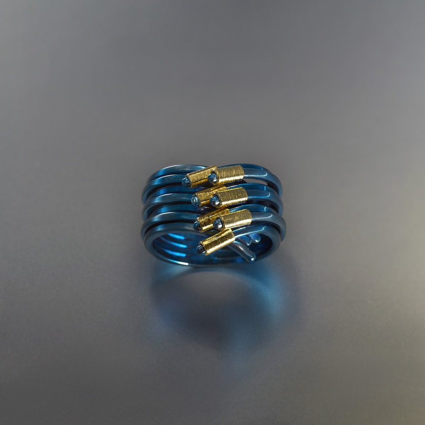 Blue titanium ring of contemporary design with gold (small size)