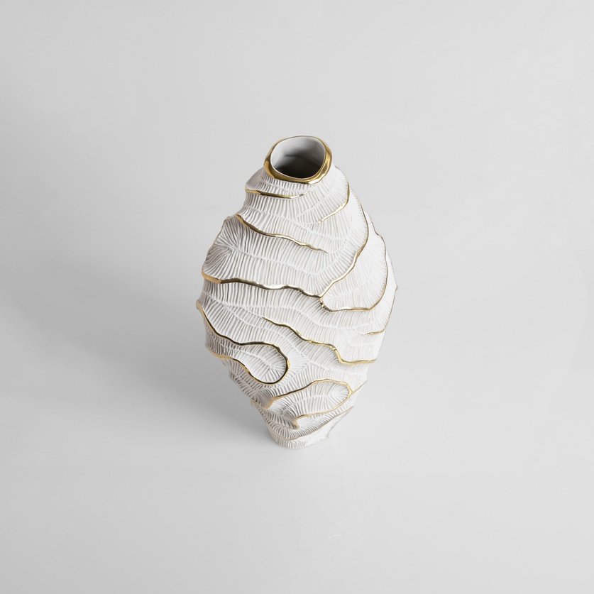 Striking porcelain form with gold accents