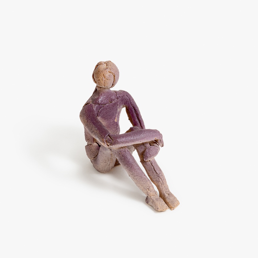 Ceramic seated figurine