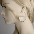 "Half-moon" hoops in gold and white silver