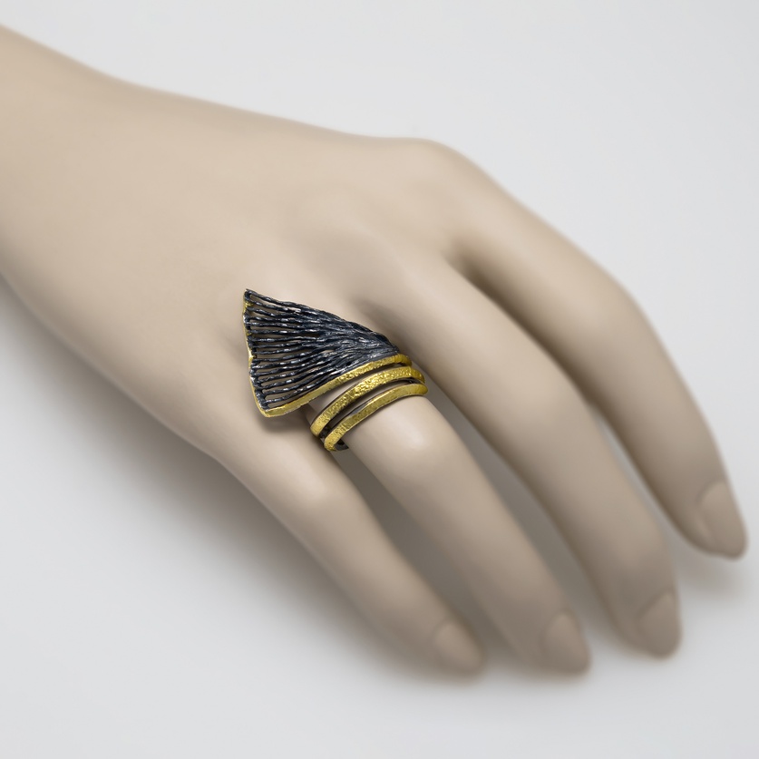 Wavy silver ring with gold inlay