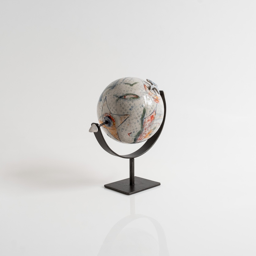 Ceramic globe with bird