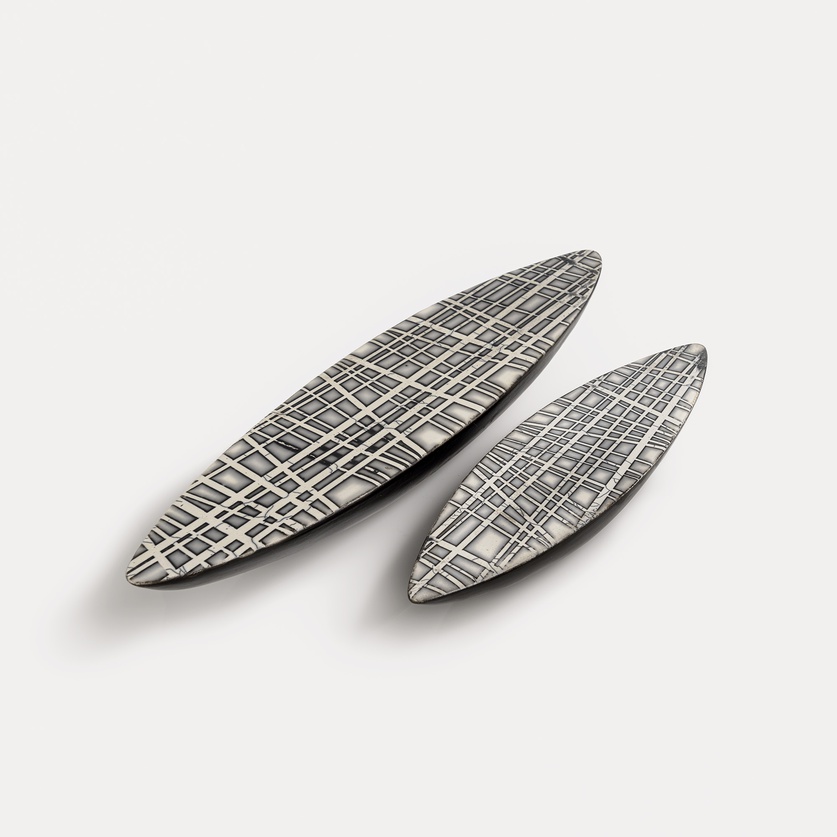 Minimal decorative ceramic canoe-shaped form