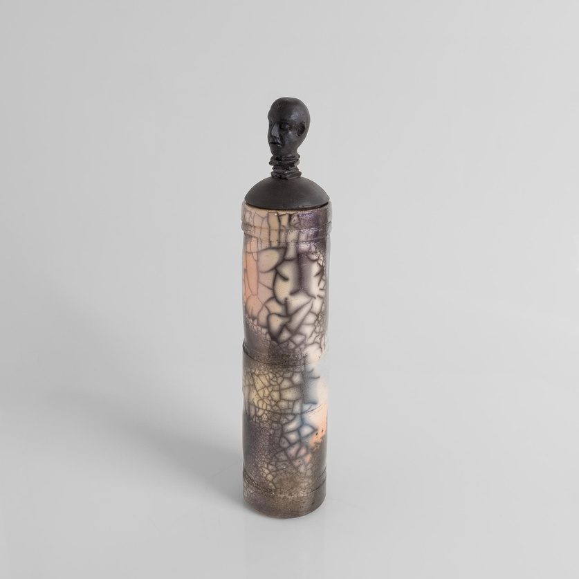 Cylindrical figure-head