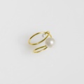 Gold ring of intricate detail with freshwater pearls