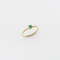 Square ring in gold with emerald