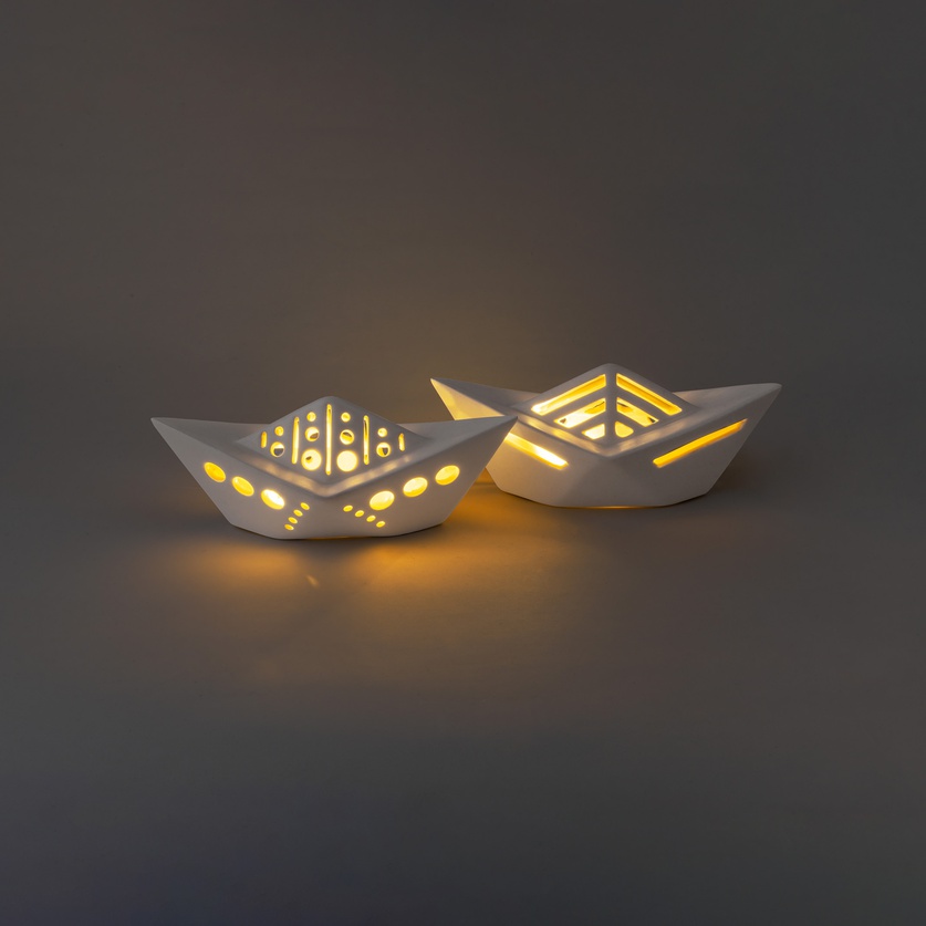 Small porcelain boat with light