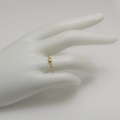Square gold ring with princess-cut diamond