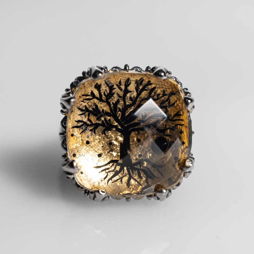 Silver ring with engraved quartz featuring a tree