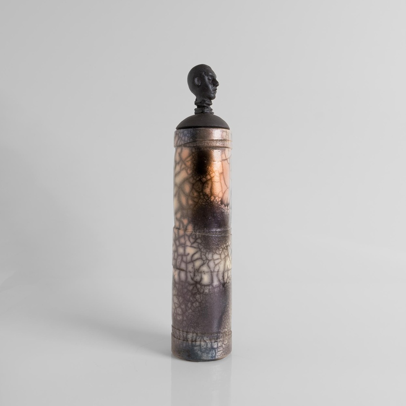Cylindrical figure-head