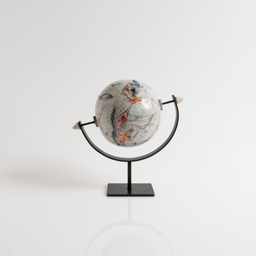 Ceramic globe with bird
