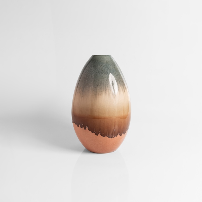 Oval ceramic vase in earthy tones