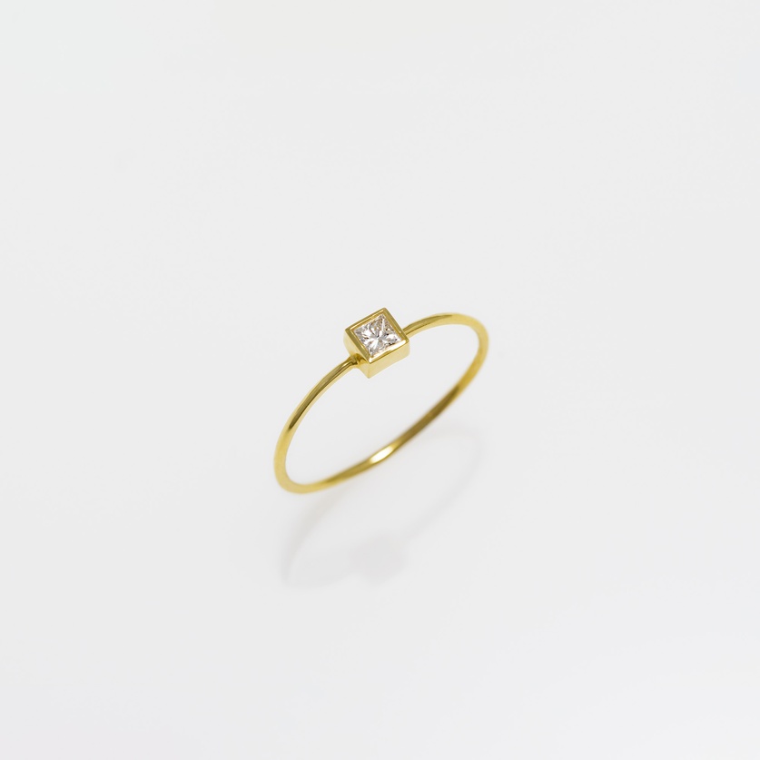 Square gold ring with princess-cut diamond