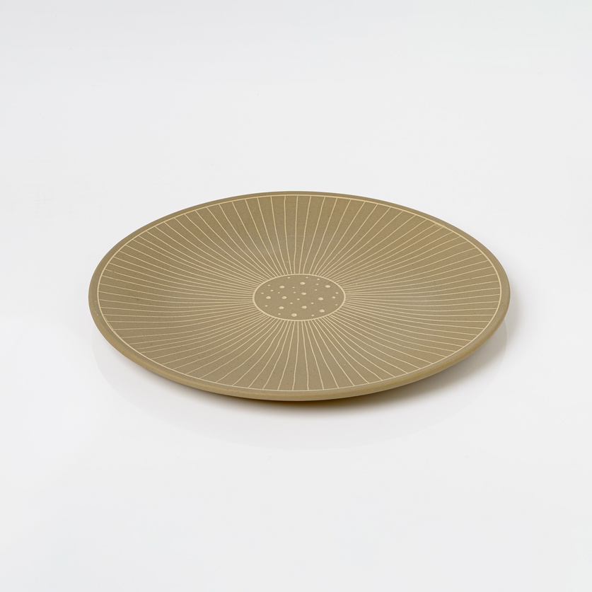 Beige round ceramic platter