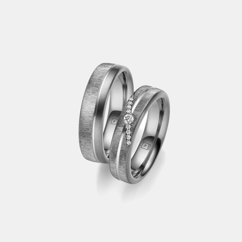Tantalum wedding ring with a diagonal diamond row design