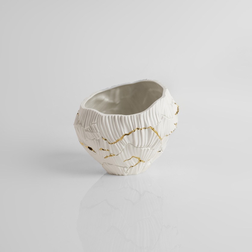 Low porcelain form with gold accents