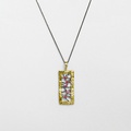 Elegant silver pendant with frame in gold inlay and rubies