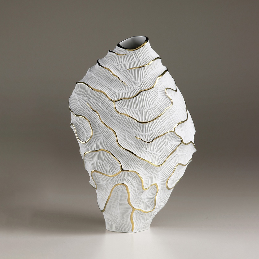 Striking porcelain form with gold accents