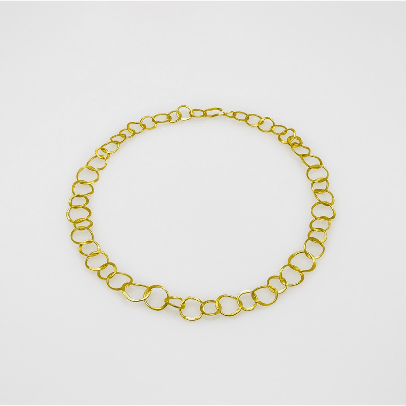 Gold necklace of classical beauty with hoops